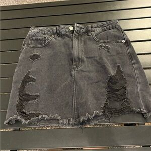 Distressed denim mini skirt black